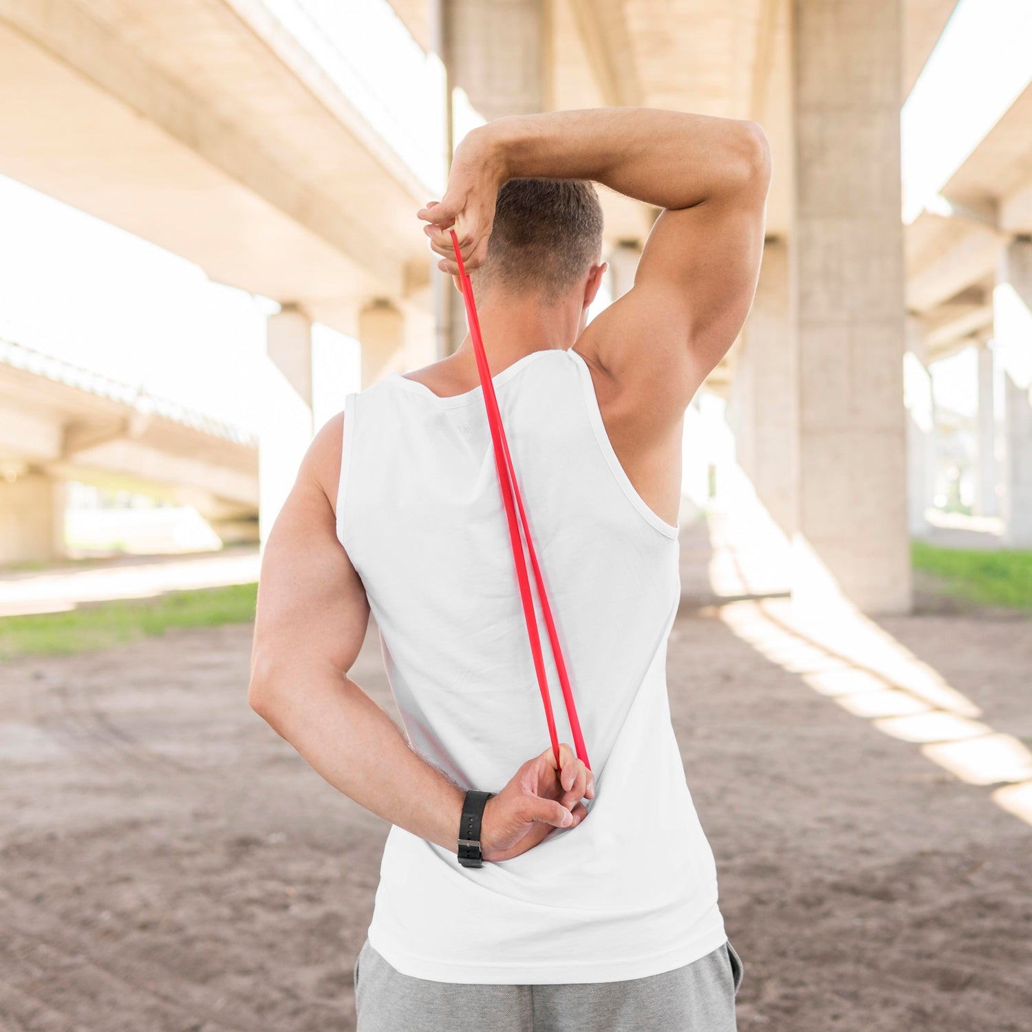 back-view-man-working-out-with-red-stretching-band_22908b1a-226f-49e4-8827-c12d4740dd82